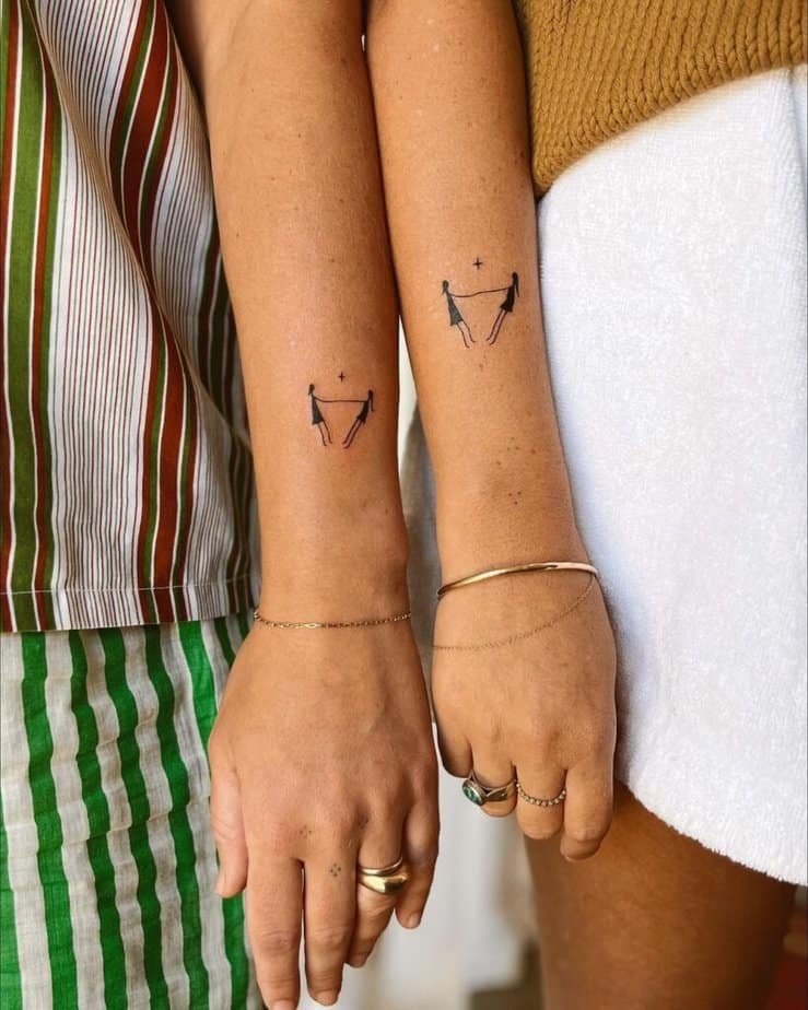7. A stick figure matching tattoo 